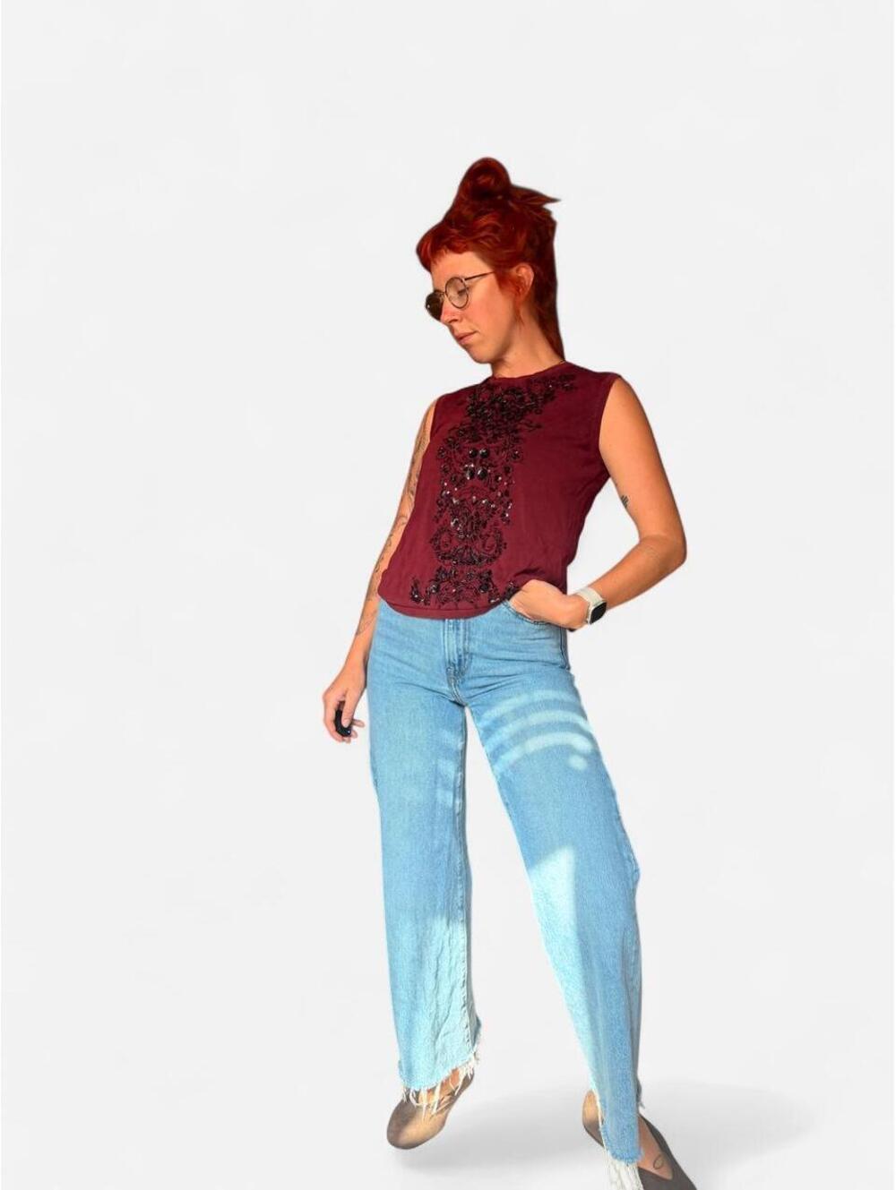 100% silk vintage top. Beautiful black beading on top on a knitted maroon silk.